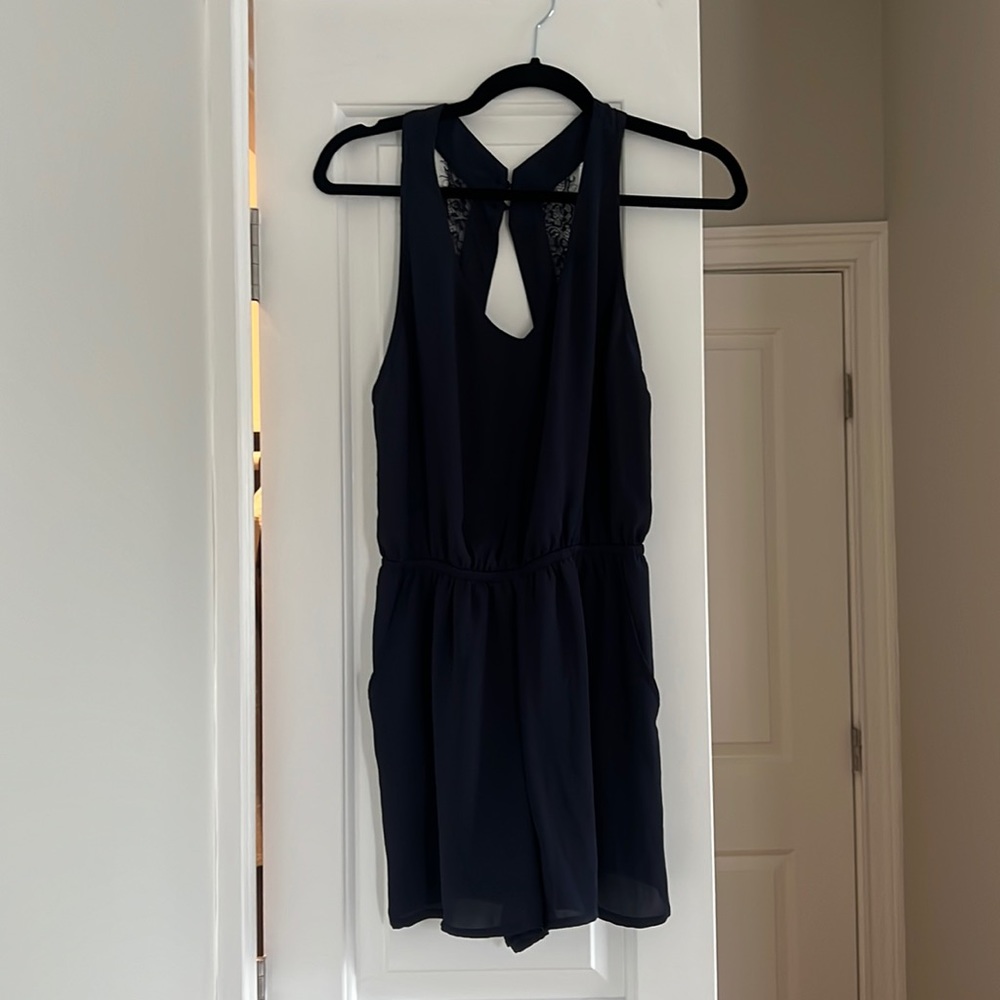 H&M navy romper with lace detail in back!
